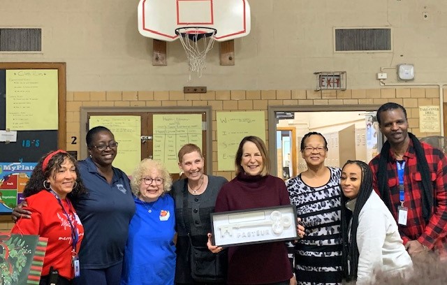 Friends of Pasteur receive key to the school